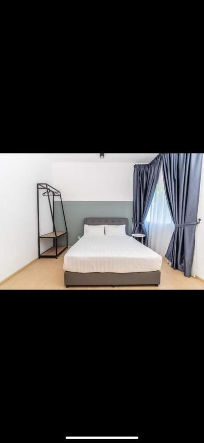 Lily Homes Tanah Rata Luaran gambar